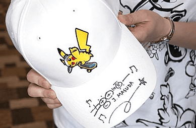 「ポケモンワールドチャンピオンシップス２０１１」の写真の増田順一氏のサイン帽子